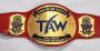 Custom championship belt with red leather strap and "TAW" lettering on gold plates