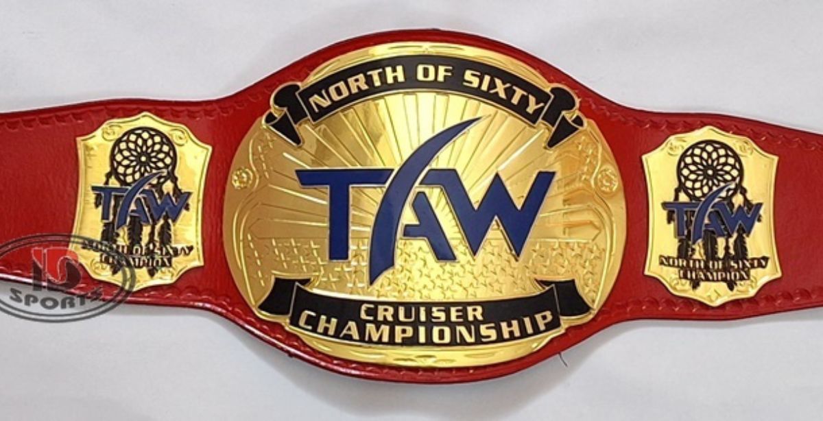Custom championship belt with red leather strap and "TAW" lettering on gold plates