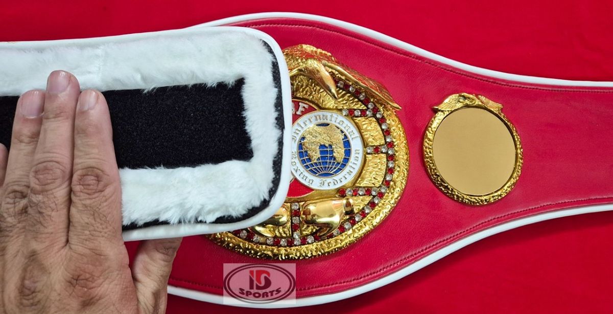 IBF championship belt replica, red leather strap detail