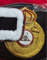 WBA Close Crown - straight-on close-up of closed gold crown medallion