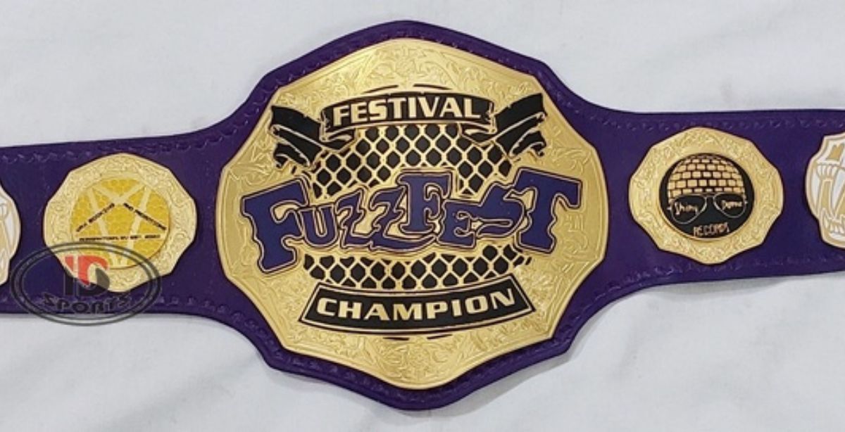 Custom championship belt with purple leather strap and gold eagle crest