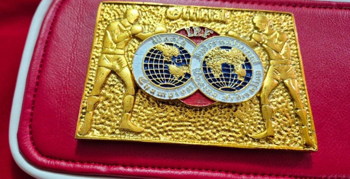 IBF championship belt replica on display stand