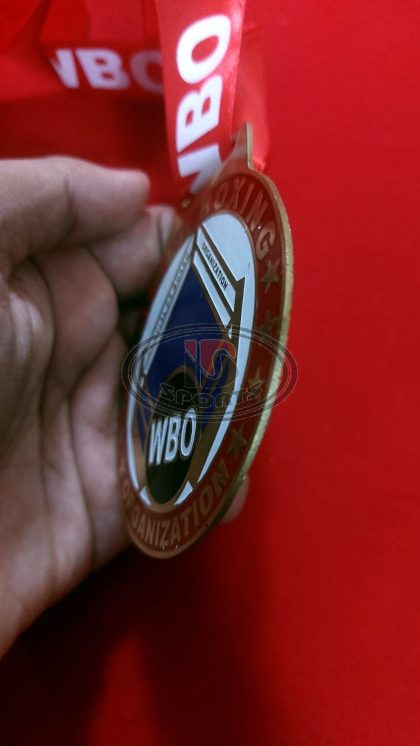 WBO custom brass medal, close-up detail