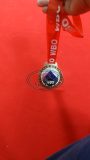 WBO custom brass medal, ribbon detail