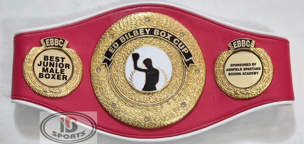 Custom boxing championship belt with red leather strap and gold boxing-glove emblem