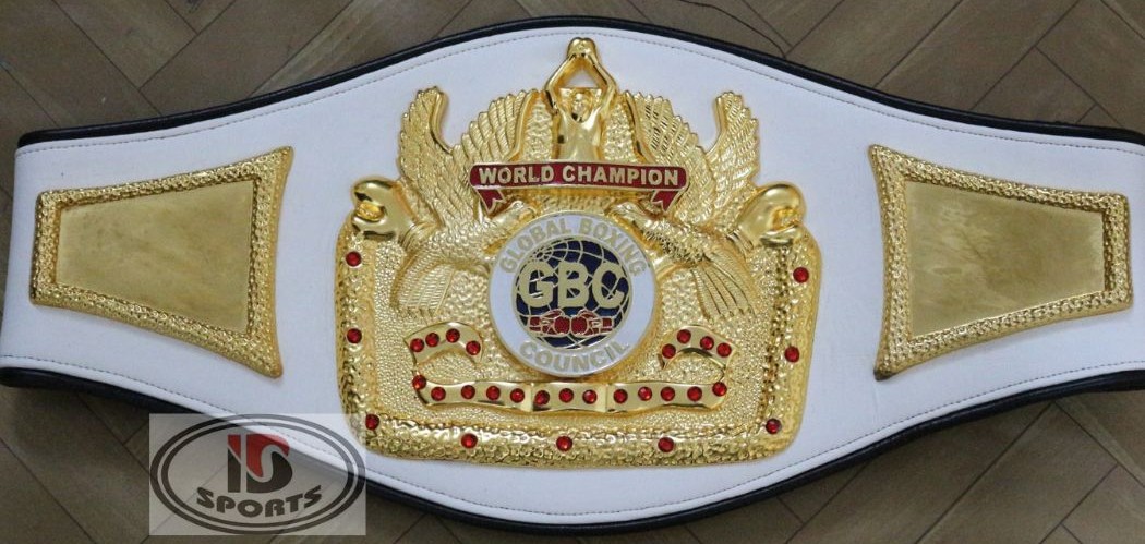 Custom boxing championship belt with cream leather strap and gold crown plates