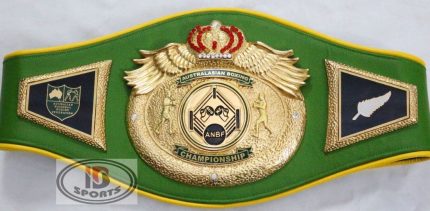 Custom Boxing Championship Belt Design 1 - green leather with yellow trim strap with a gold crown and wings medallion with a blue and red center emblem