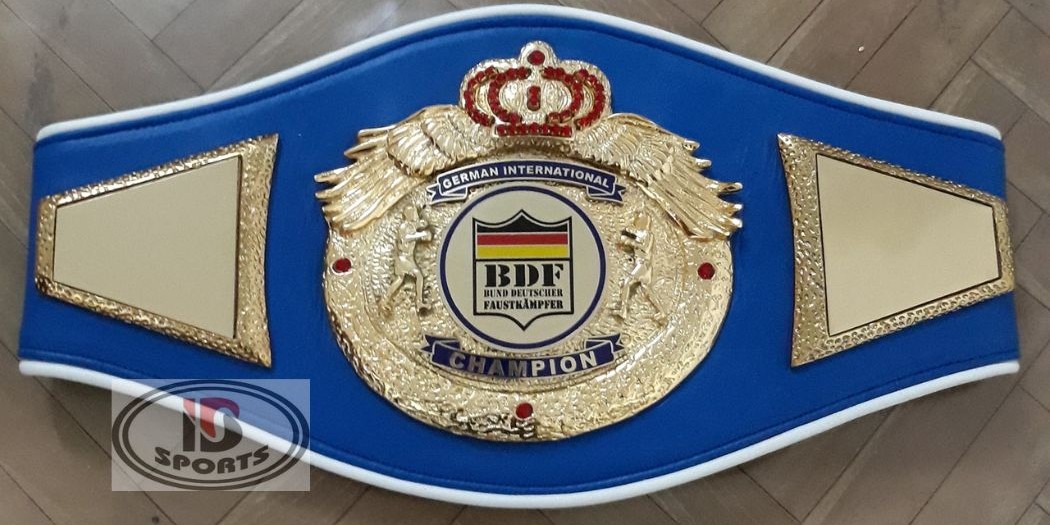 Custom boxing championship belt with blue leather strap and gold crown emblem