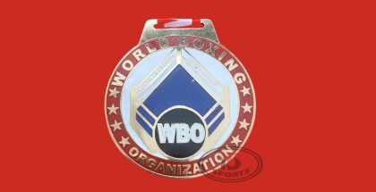 WBO custom brass medal with ribbon