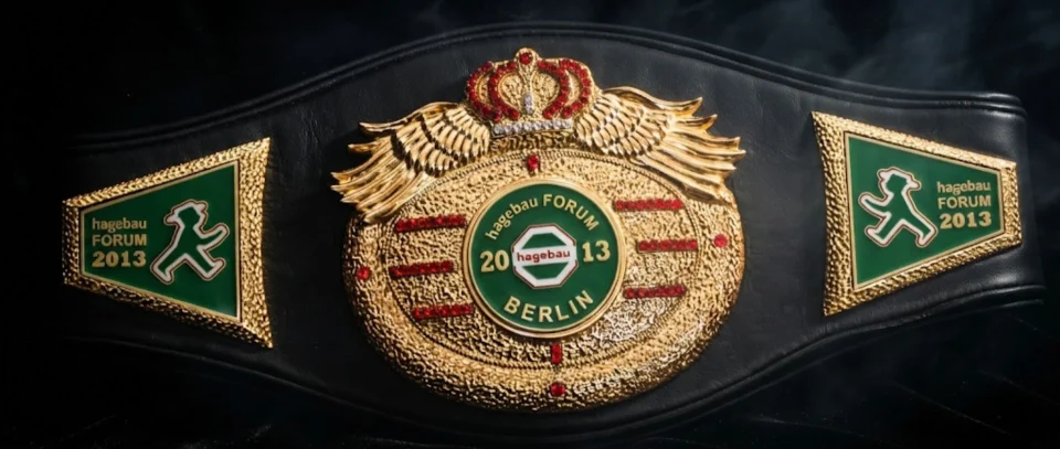 Custom championship boxing belt with dramatic lighting