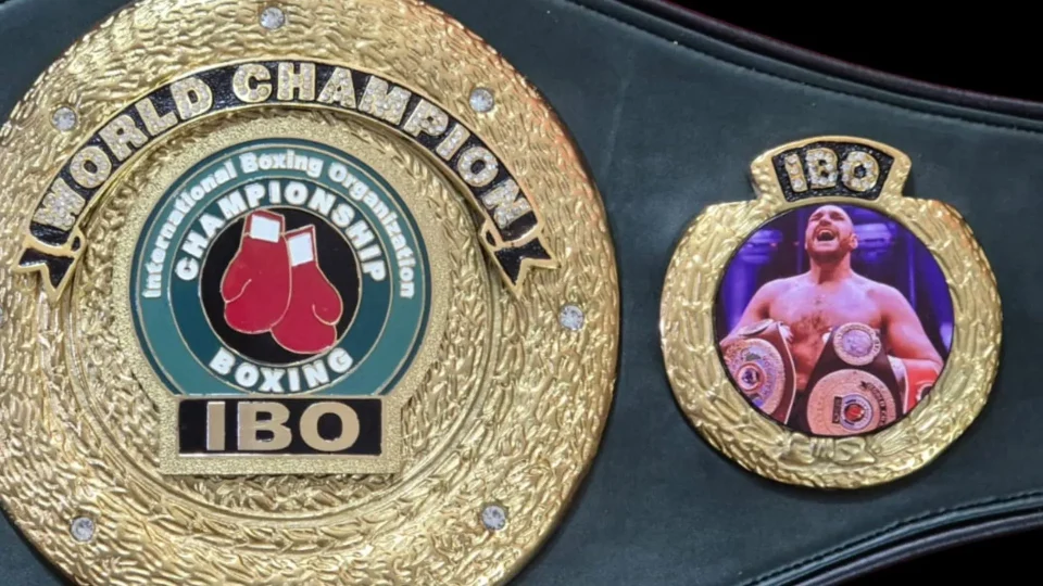 Custom championship belt side plates showing Tyson Fury
