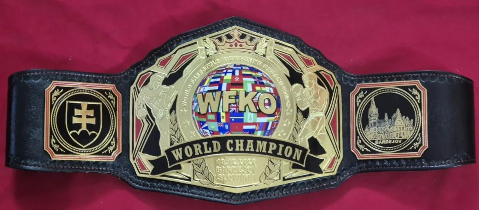 Championship belt plate with a black painted finish, made at the Ibrahim Sports workshop