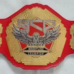 Cheap custom championship belt with etched brass plates on a workbench in Sialkot