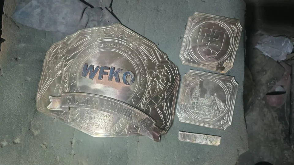Etched brass championship belt plate cut to a custom octagon shape at the Ibrahim Sports workshop